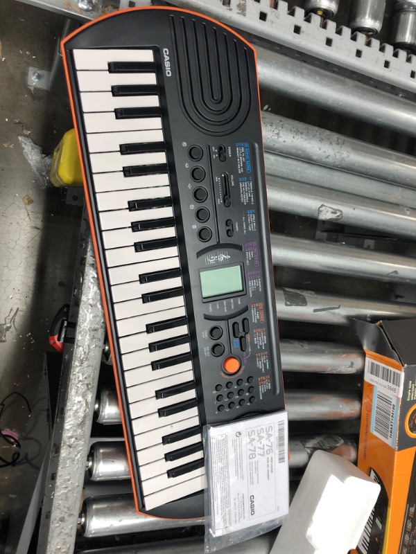 Photo 2 of Casio SA-76 44 Key Mini Keyboard, Orange
