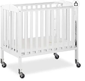 Photo 1 of Dream On Me 3 in 1 Portable Folding Stationary Side Crib in White, Greenguard Gold Certified, Safety Wheel with Locking Casters, Convertible, 3 Mattress Heights
