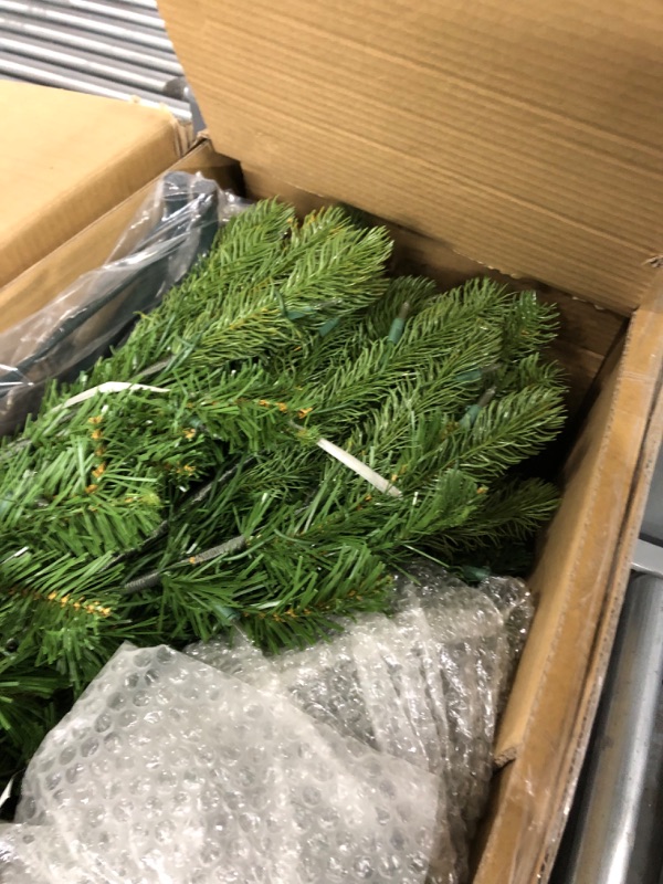 Photo 5 of **USED ITEM**
National Tree Company Pre-Lit 'Feel Real' Artificial Full Downswept Christmas Tree, Green, Douglas Fir, White Lights, Includes Stand, 6.5 feet 6.5 ft