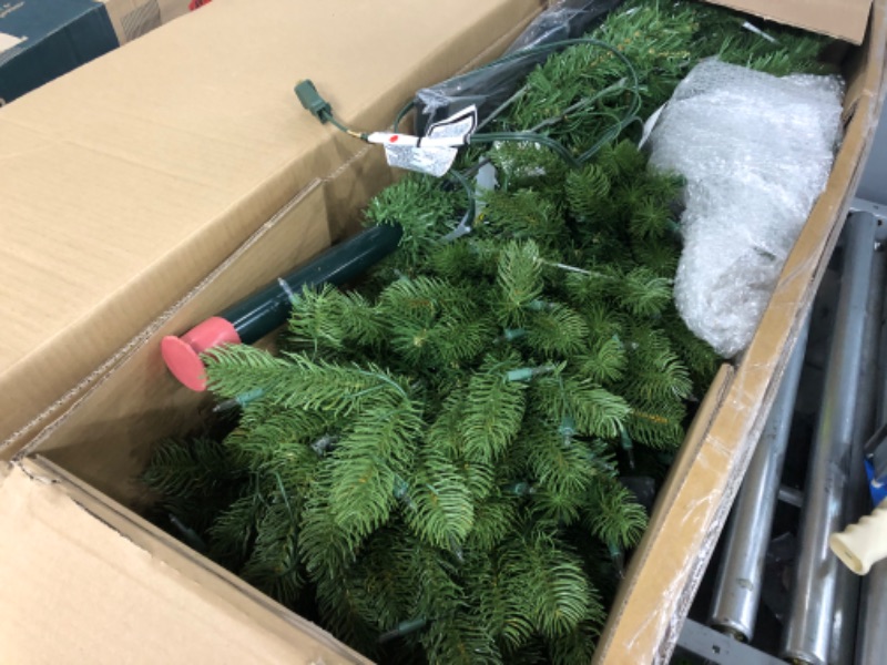 Photo 3 of **USED ITEM**
National Tree Company Pre-Lit 'Feel Real' Artificial Full Downswept Christmas Tree, Green, Douglas Fir, White Lights, Includes Stand, 6.5 feet 6.5 ft