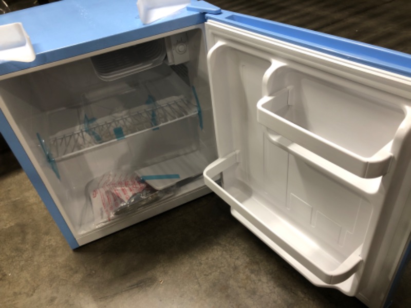 Photo 3 of ***NOT TESTED/MINOR DAMAGE***Frigidaire EFR176-BLUE 1.6 cu ft Blue Retro Fridge with Side Bottle Opener. for The Office, Dorm Room or Cabin