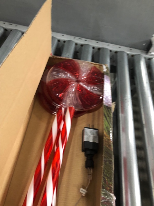 Photo 3 of **USED-ITEM**
Alpine Corporation 28" H Outdoor Candy Cane Yard Stakes with Red and White LED Lights (Set of 3)
