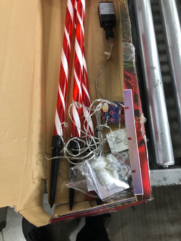Photo 4 of **USED-ITEM**
Alpine Corporation 28" H Outdoor Candy Cane Yard Stakes with Red and White LED Lights (Set of 3)