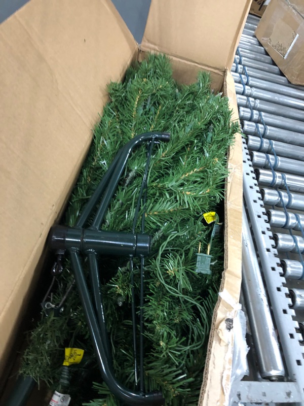 Photo 2 of **used**
National Tree Company Pre-Lit Artificial Full Christmas Tree, Green, North Valley Spruce, White Lights, Includes Stand, 4.5 Feet 4.5 ft