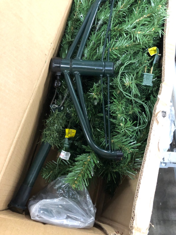 Photo 4 of **used**
National Tree Company Pre-Lit Artificial Full Christmas Tree, Green, North Valley Spruce, White Lights, Includes Stand, 4.5 Feet 4.5 ft