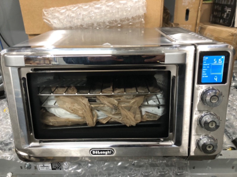 Photo 3 of "SEE NOTES"
De'Longhi Air Fry Oven, Premium 9-in-1 Digital Air Fry Convection Toaster Oven, Grills, Broils, Bakes, Roasts, Keep Warm, Reheats, 1800-Watts + Cooking Accessories, Stainless Steel, 14L, EO141164M 14L Air Fry Oven