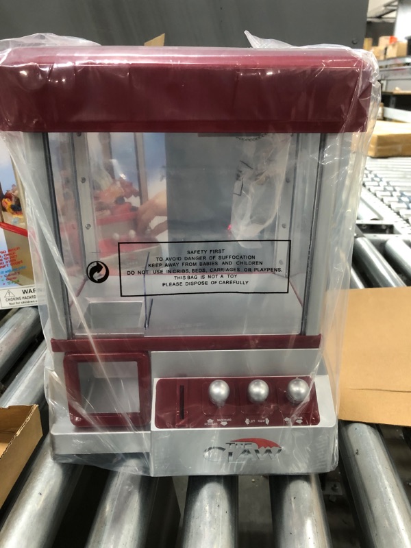 Photo 1 of Electronic Arcade Claw Machine Mini Candy Prize Dispenser Game With Sound
