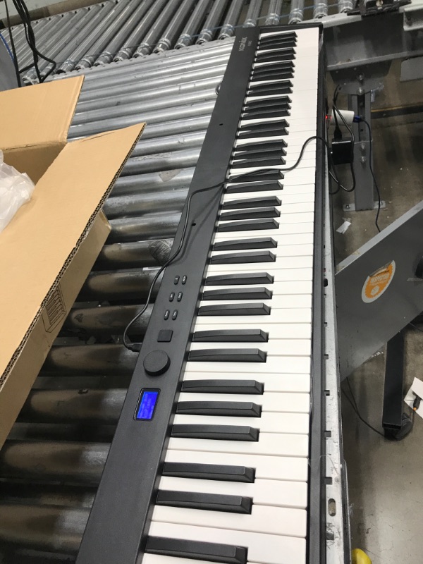 Photo 3 of *Tested* KONIX Folding Piano Keyboard 88 Key Full Size Semi-Weighted Portable Keyboard Piano, Bluetooth Electric Piano with Sheet Music Stand, Sustain Pedal and Piano Bag