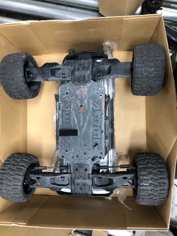 Photo 4 of ARRMA RC Truck 1/10 Outcast 4X4 4S V2 BLX Stunt Truck RTR (Battery and Charger Not Included), Bronze, ARA4410V2T1