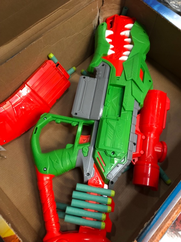 Photo 4 of **used item***
NERF DinoSquad Rex-Rampage Motorized Dart Blaster, 10-Dart Clip, 20 Official Darts, 10-Dart Storage- T-Rex Dinosaur Design Frustration-Free Packaging