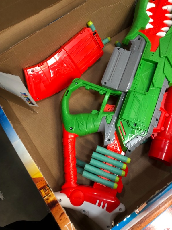 Photo 3 of **used item***
NERF DinoSquad Rex-Rampage Motorized Dart Blaster, 10-Dart Clip, 20 Official Darts, 10-Dart Storage- T-Rex Dinosaur Design Frustration-Free Packaging