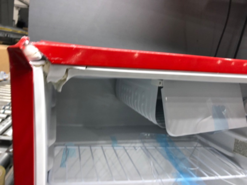 Photo 5 of ***LEFT SIDE OF FRIDGE HAS LARGE DENTS, SEE PHOTOS***
Frigidaire EFR115-RED 1.6 Cu Ft Compact Fridge for Office, Dorm Room, Mancave or RV, Red