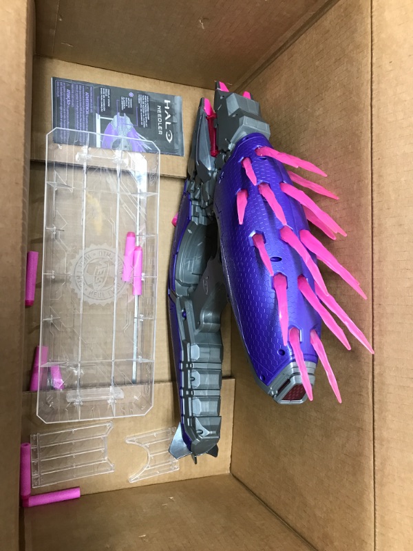 Photo 4 of *** See clerk notes**
NERF LMTD Halo Needler Dart-Firing Blaster, Light-Up Needles, 10-Dart Rotating Drum, 10 Elite Darts, Game Card with in-Game Content