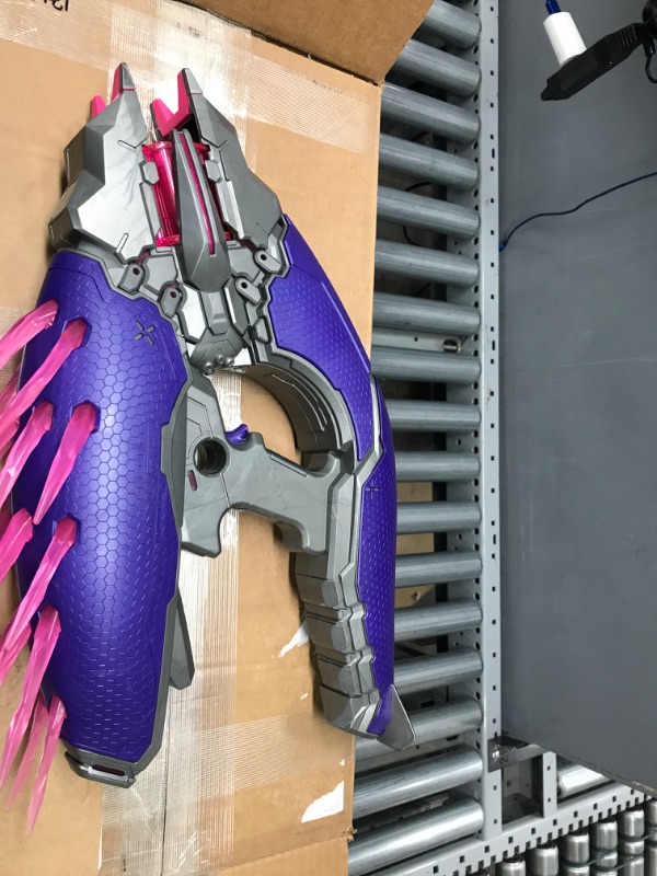 Photo 3 of *** See clerk notes**
NERF LMTD Halo Needler Dart-Firing Blaster, Light-Up Needles, 10-Dart Rotating Drum, 10 Elite Darts, Game Card with in-Game Content