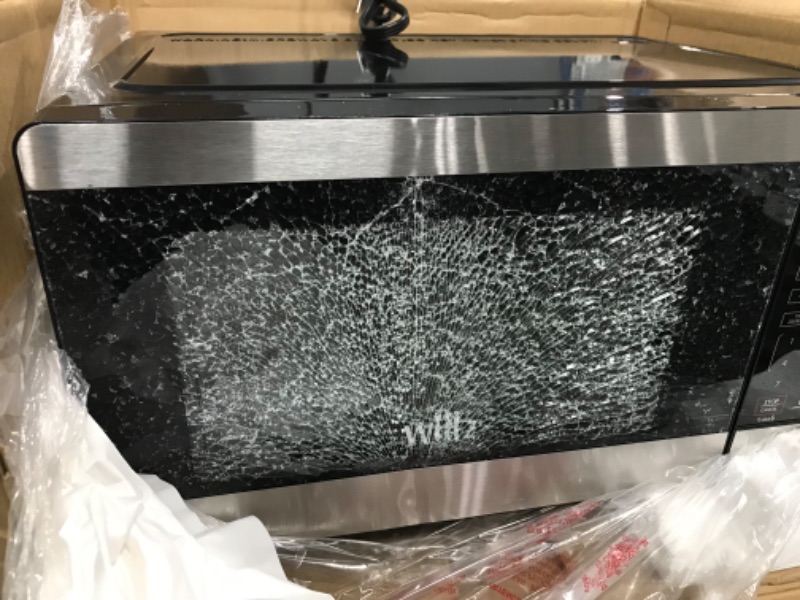 Photo 5 of ***window on door is completely shattered see photo**
Willz WLCMV207S2-07 Countertop Small Microwave Oven with 6 Preset Cooking Programs Interior Light LED Display, 0.7 Cu.Ft, Stainless Steel

