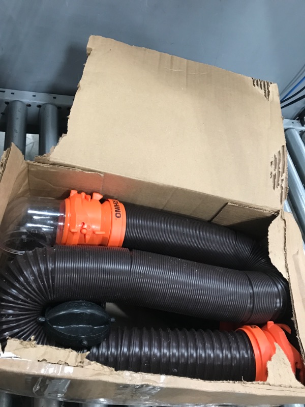 Photo 2 of Camco 20' (39742) RhinoFLEX 20-Foot RV Sewer Hose Kit, Swivel Transparent Elbow with 4-in-1 Dump Station Fitting-Storage Caps Included , Black , Brown 20ft Sewer Hose Kit Frustration-Free Packaging