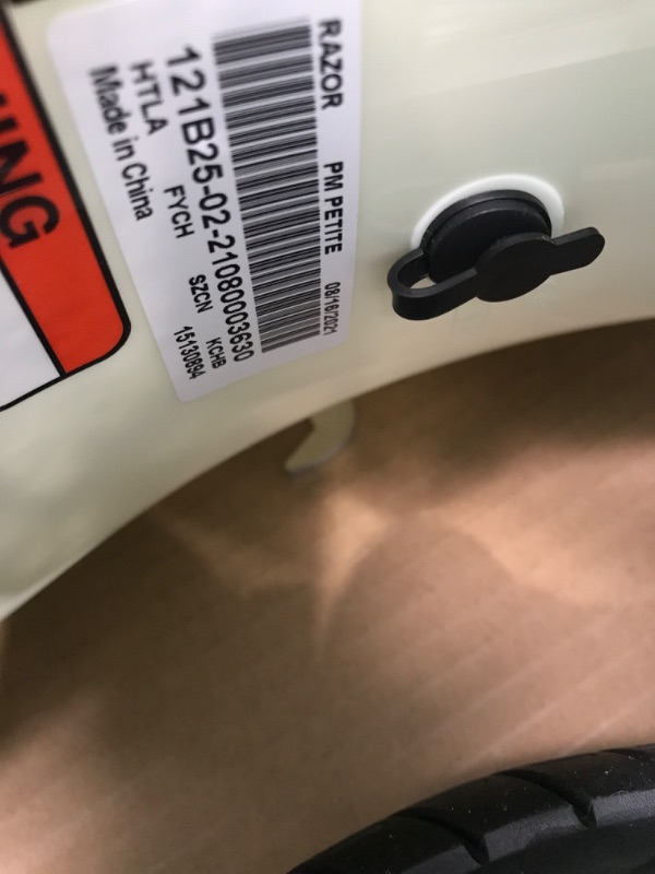 Photo 5 of Razor Pocket Mod Petite - 12V Miniature Euro-Style Electric Scooter for Ages 7+, 100-watt Motor, Up to 40 min Ride Time, For Riders up to 110 lbs