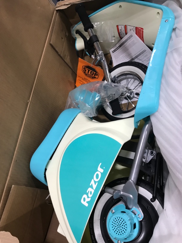 Photo 1 of Razor Pocket Mod Petite - 12V Miniature Euro-Style Electric Scooter for Ages 7+, 100-watt Motor, Up to 40 min Ride Time, For Riders up to 110 lbs