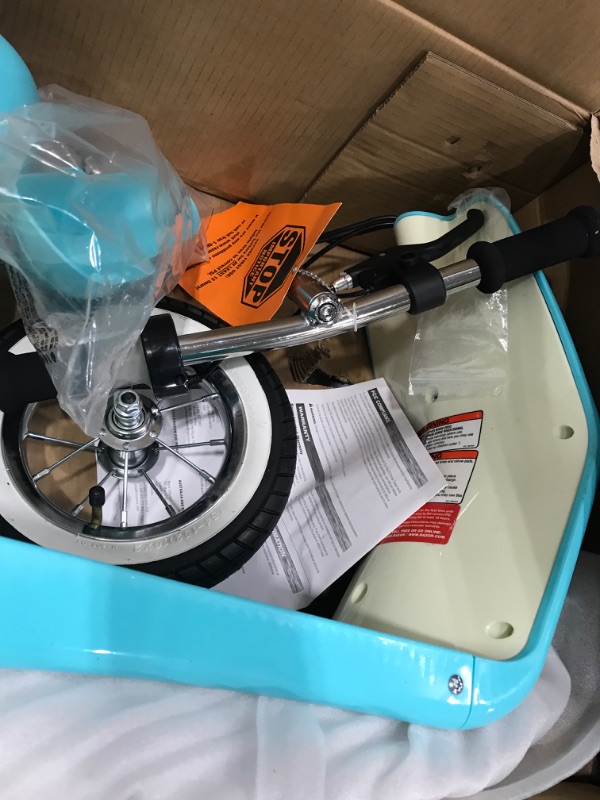 Photo 3 of Razor Pocket Mod Petite - 12V Miniature Euro-Style Electric Scooter for Ages 7+, 100-watt Motor, Up to 40 min Ride Time, For Riders up to 110 lbs