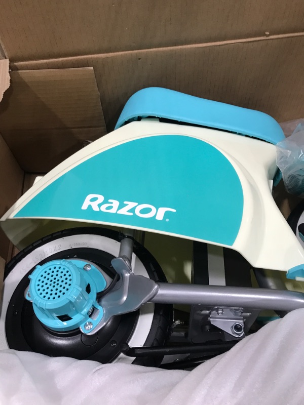 Photo 4 of Razor Pocket Mod Petite - 12V Miniature Euro-Style Electric Scooter for Ages 7+, 100-watt Motor, Up to 40 min Ride Time, For Riders up to 110 lbs