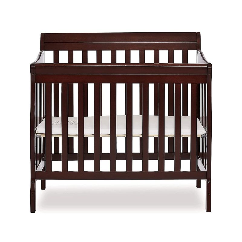 Photo 1 of Dream On Me Aden 4-in-1 Convertible Mini Crib In Espresso, Greenguard Gold Certified, Non-Toxic Finish, New Zealand Pinewood, With 3 Mattress Height Settings
