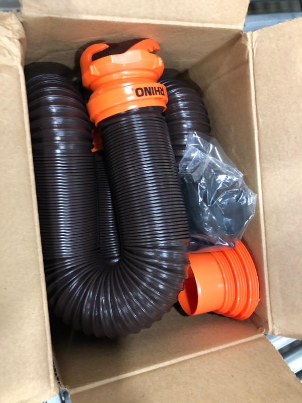 Photo 2 of Camco RhinoFLEX RV Sewer Hose Kit with Swivel Transparent Elbow and 4-in-1 Dump Station Fitting, Brown, 15 Feet (39770) 15ft Sewer Hose Kit Frustration-Free Packaging