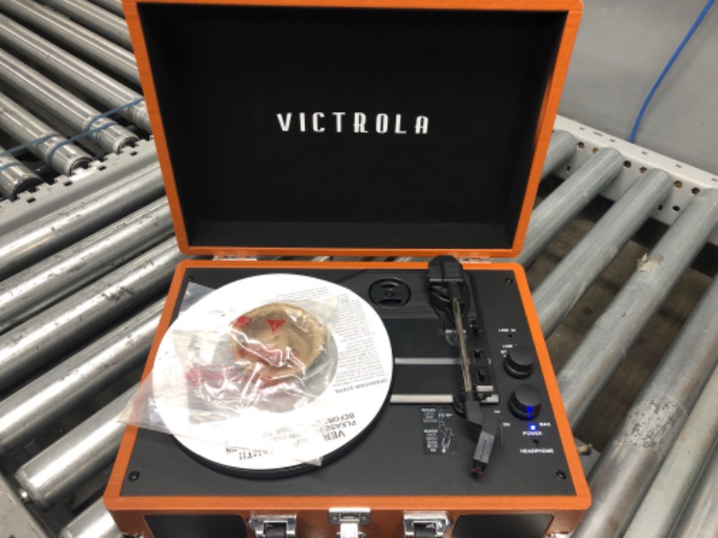 Photo 2 of Victrola Vintage 3-Speed Bluetooth Portable Suitcase Record Player with Built-in Speakers, Upgraded Turntable Audio Sound, Cognac Cognac Record Player