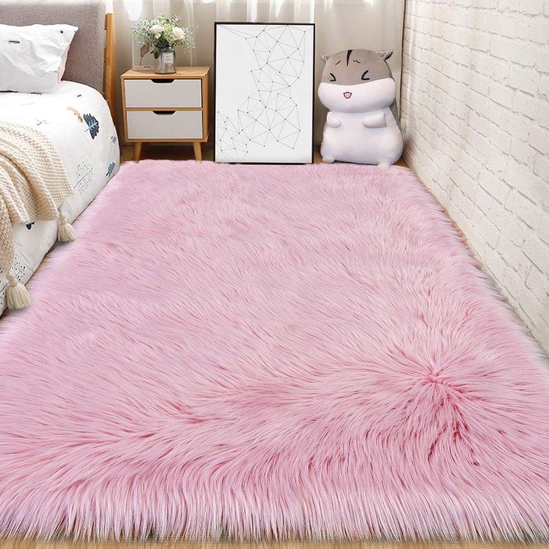 Photo 1 of Andecor Soft Fluffy Faux Fur Bedroom Rugs 4 x 6 Feet Indoor Wool Sheepskin Area Rug for Girls Baby Living Room Chair Sofa Home Decor Floor Carpet, Pink