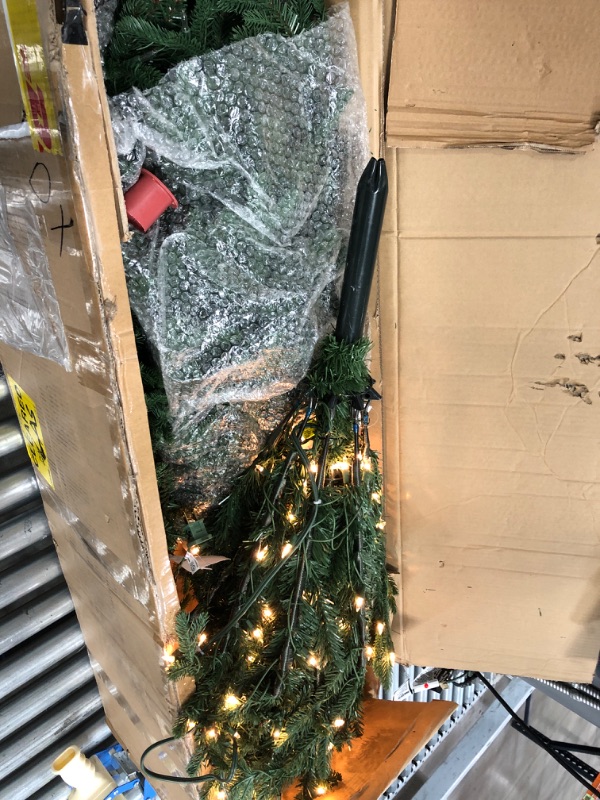 Photo 1 of National Tree Company Pre-Lit 'Feel Real' Artificial Slim Christmas Tree, Green, Tiffany Fir, White Lights, Includes Stand, 7.5 Feet 7.5 ft Tree