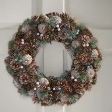 Photo 1 of  Pine Cone and Glitter Artificial Christmas Wreath, Natural and White by Christopher Knight Home