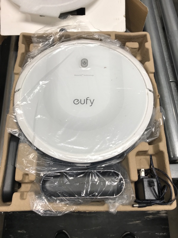 Photo 2 of (Used) eufy by Anker, BoostIQ RoboVac 11S MAX, Robot Vacuum Cleaner, Super-Thin, 2000Pa Super-Strong Suction, Quiet, Self-Charging Robotic Vacuum Cleaner, Cleans Hard Floors to Medium-Pile Carpets, White