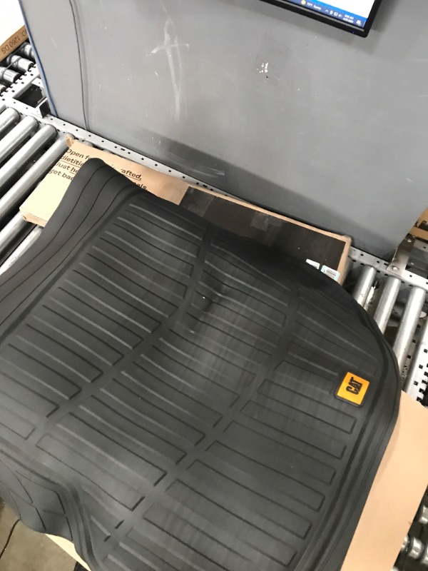 Photo 1 of Caterpillar ToughRide Heavy Duty Automotive Rubber Cargo Liner Trunk Floor Mat, All Weather Protection, Trimmable to Fit Most Vehicles Car Truck Van SUV, Black, 53" x 36.25"in