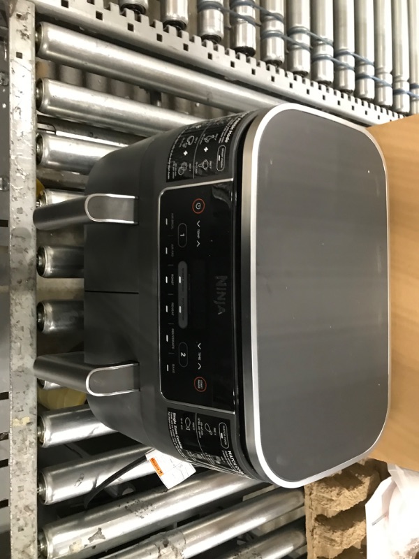 Photo 2 of **used item**
Ninja DZ201 Foodi 8 Quart 6-in-1 DualZone 2-Basket Air Fryer with 2 Independent Frying Baskets, Match Cook & Smart Finish to Roast, Broil, Dehydrate & More for Quick, Easy Meals, Grey