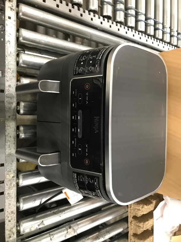 Photo 5 of **used item**
Ninja DZ201 Foodi 8 Quart 6-in-1 DualZone 2-Basket Air Fryer with 2 Independent Frying Baskets, Match Cook & Smart Finish to Roast, Broil, Dehydrate & More for Quick, Easy Meals, Grey
