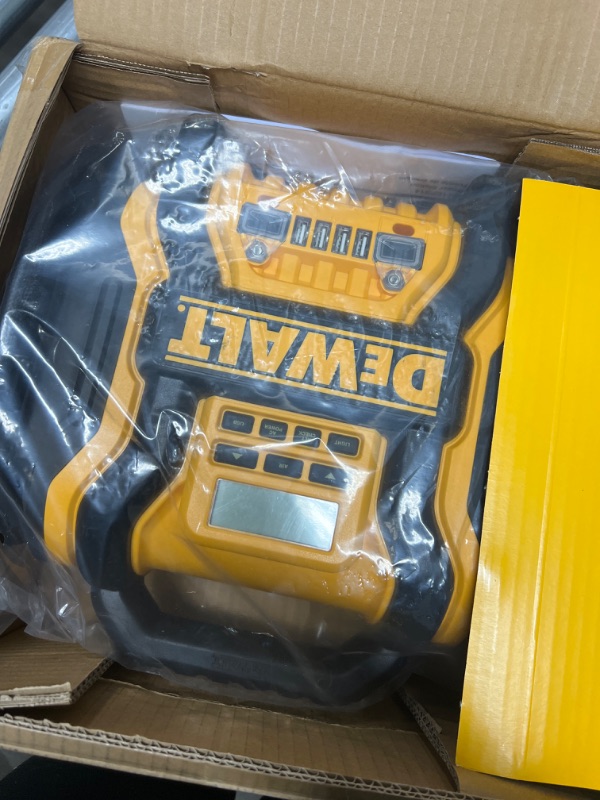 Photo 2 of DEWALT DXAEPS14 1600 Peak Battery Amp 12V Automotive Jump Starter/Power Station with 500 Watt AC Power Inverter, 120 PSI Digital Compressor, and USB Power , Yellow