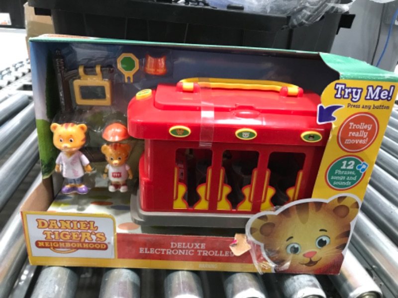 Photo 2 of Daniel Tiger's Neighborhood Deluxe Electronic Trolley Vehicle with 2 Songs, 12 Phrases, Trolley Sounds & Light! Daniel & Mom Tiger Figures Included, For Ages 3+