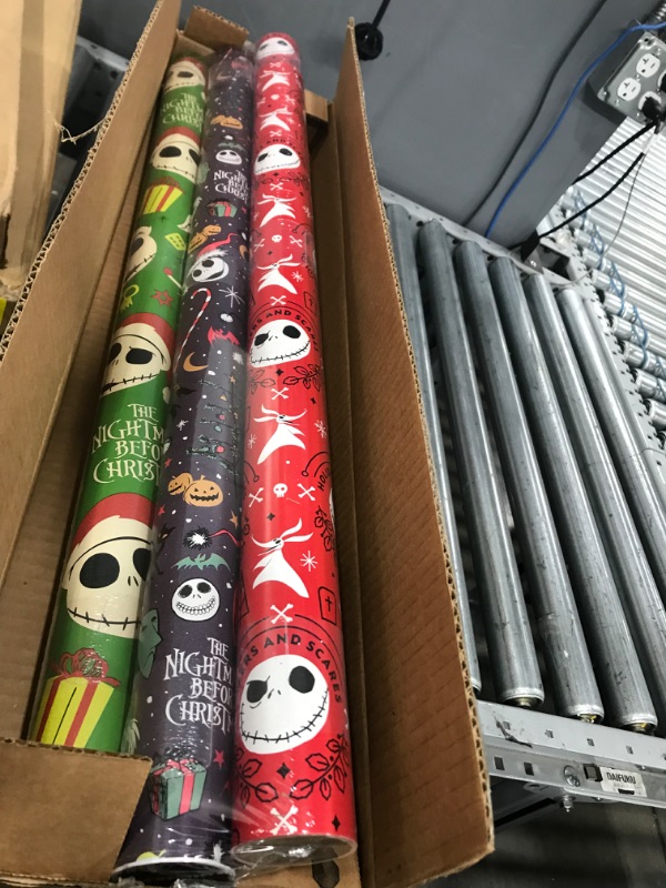 Photo 1 of American Greetings Nightmare Before Christmas Wrapping Paper Bundle with Cut Lines, Jack Skellington and Zero (3 Rolls, 105 sq. ft.)
