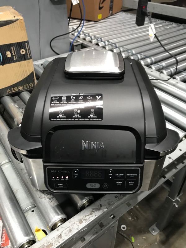 Photo 4 of *NONFUNCTONAL PARTS ONLY*- Ninja AG301 Foodi 5-in-1 Indoor Grill with Air Fry, Roast, Bake & Dehydrate, Black/Silver Black/Silver 4-Quart Indoor Grill