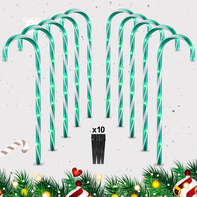 Photo 1 of 22" Candy Cane Christmas Decorations Pathway Markers Lights, Set of 10 Pack, Candy Cane Lights for Holiday Xmas Outdoor Indoor Yard Patio Garden Decor Walkway Stakes (Green)