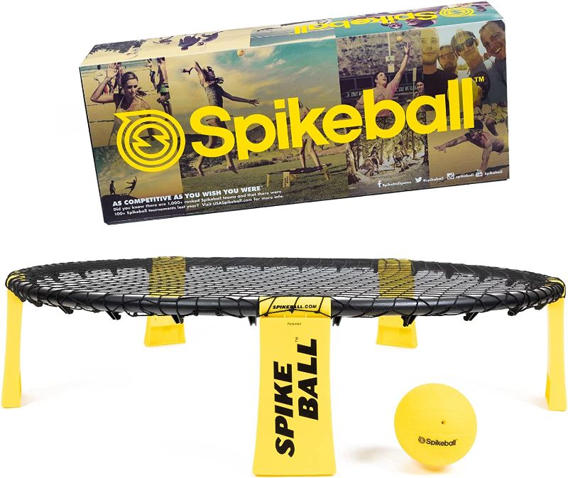 Photo 1 of Spikeball Game Set - Played Outdoors, Indoors, Lawn, Yard, Beach, Tailgate, Park - Includes 1 Ball, Drawstring Bag, and Rule Book - Game for Boys, Girls, Teens, Adults, Family
