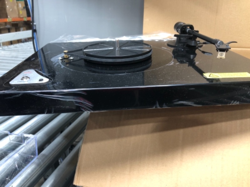Photo 1 of unable to test 
turns on 
opened 
Belt Drive Turntable with Bluetooth Connection, High Fidelity Wireless Vinyl Record Player Built-in Preamp, 2-Speed 33 1/3 & 45RPM Adjustable Counterweight, AT-3600L, Solid Wood Plinth(Piano Black)