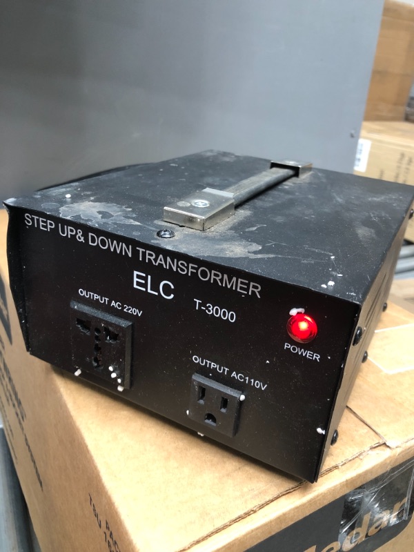 Photo 2 of used 
tested: turns on , unable to test 
ELC T-3000 3000-Watt Voltage Converter Transformer - Step Up/Down - 110V/220V - Circuit Breaker Protection [3-Years Warranty], black 3000 Watts