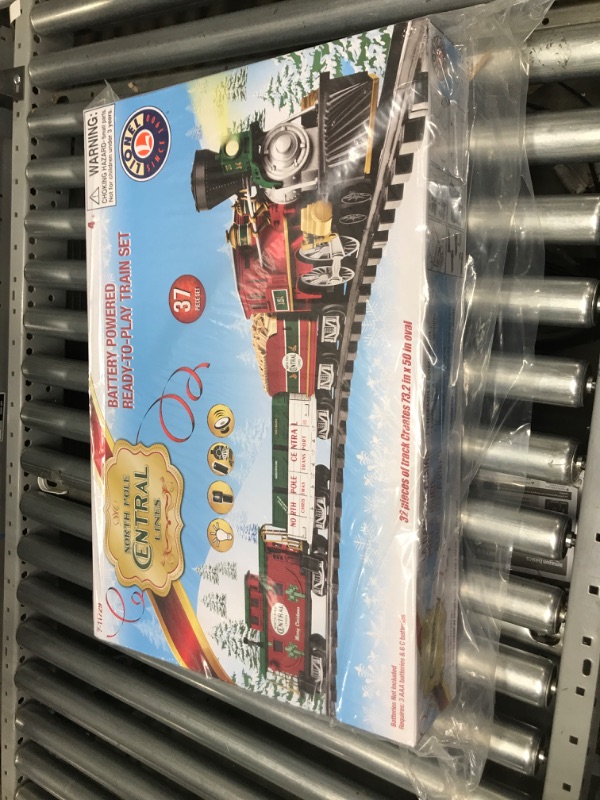 Photo 2 of ***FACTORY SEALED PACKAGING*** Lionel North Pole Central Ready-to-Play Freight Set, Battery-powered Model Train Set with Remote Multi, 50 x 73" 50 x 73 in