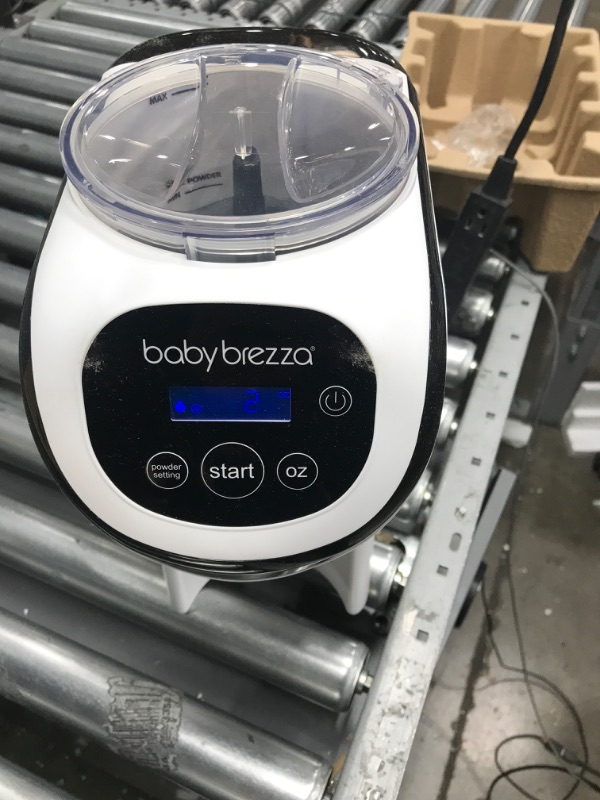 Photo 2 of Baby Brezza Formula Pro Mini Baby Formula Maker – Small Baby Formula Mixer Machine Fits Small Spaces and is Portable for Travel– Bottle Makers Makes The Perfect Bottle for Your Infant On The Go *CUP NOT INCLUDED*