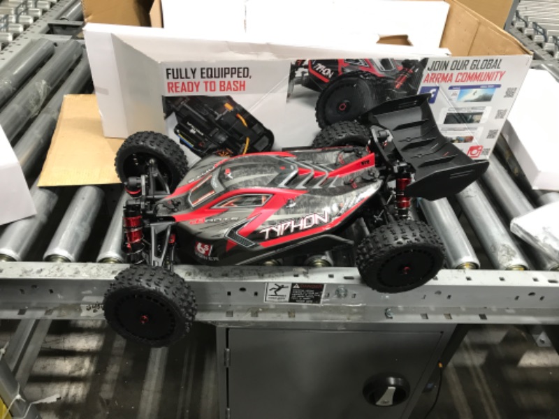 Photo 2 of SEE NOTES*** ARRMA RC Car 1/8 Typhon 6S V5 4WD BLX Buggy with Spektrum Firma RTR (Ready-to-Run), Black and Red, ARA8606V5