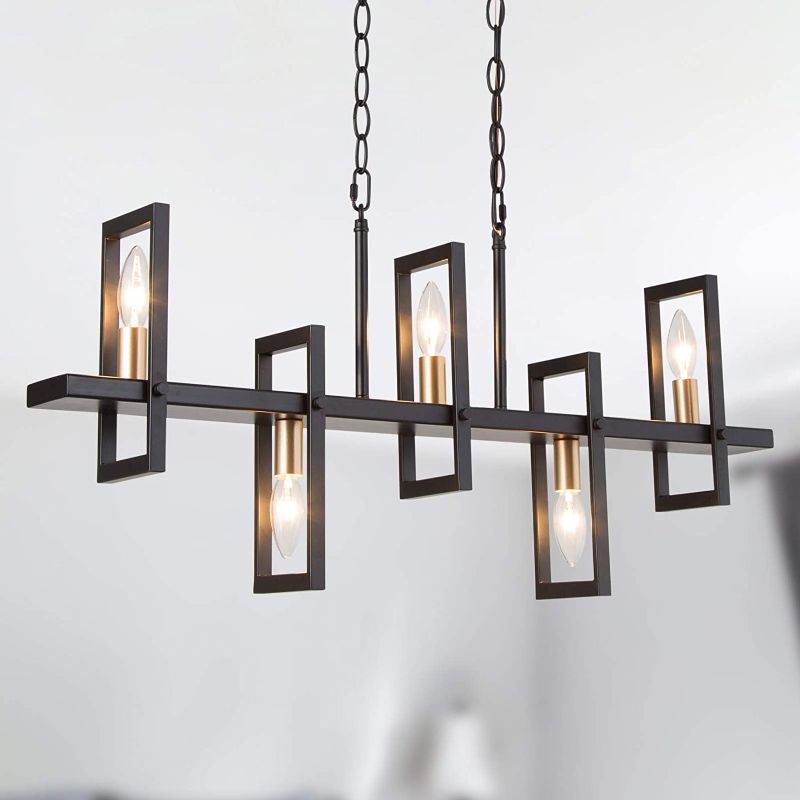 Photo 1 of **INCOMPLETE** ELLIE GEOMETRIC LINEAR CHANDELIER
Size: 31.5''L * 4''W * 13''H
Material: Iron
Finish: Satin Gold + Matte Black
UL Safety Rated: DRY
Lights Qty: 5
Canopy Size: 8.7''L * 4.7"H
Chain: Adjustable, 1'' - 59''
Bulb: Type T, Max 60W (Bulb not incl