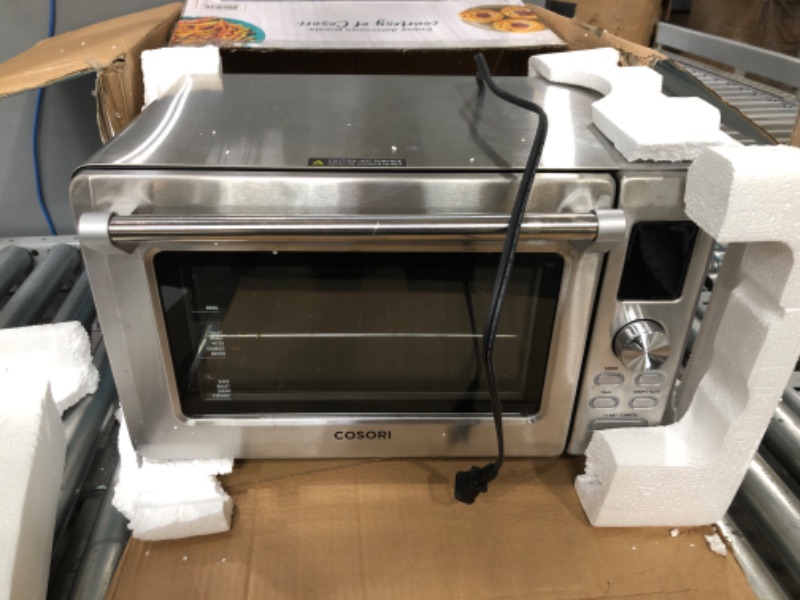 Photo 2 of **** USED **** *** TESTED DOES NOT POWER ON *** ** PARTS ONLY **
COSORI Toaster Oven Combo, 11-in-1 Convection oven countertop, Rotisserie & Dehydrator, 12 inch pizza, 52 Recipes & 6 Accessories, Stainless steel