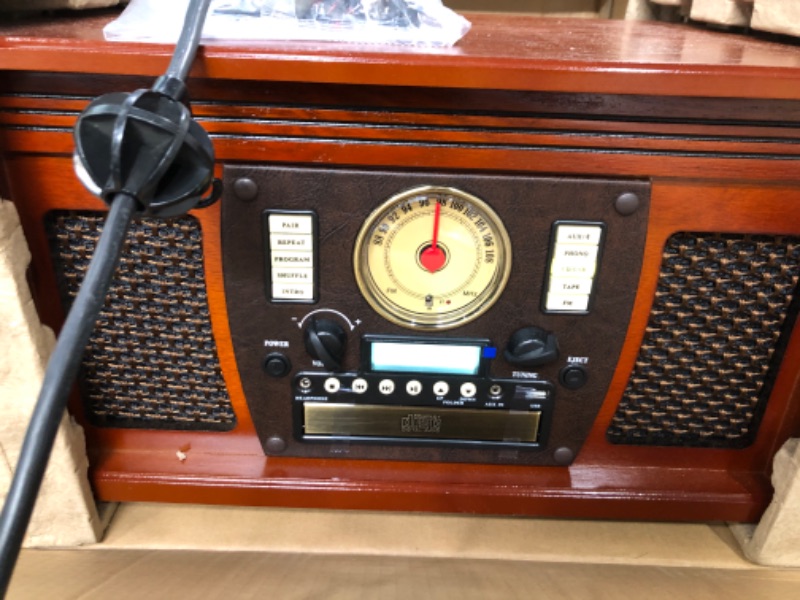 Photo 2 of **** NEW ****
Victrola Navigator 8-in-1 Classic Bluetooth Record Player with USB Encoding and 3-Speed Turntable Bundle with Victrola Wooden Stand for Wooden Music Centers with Record Holder Shelf, Mahogany