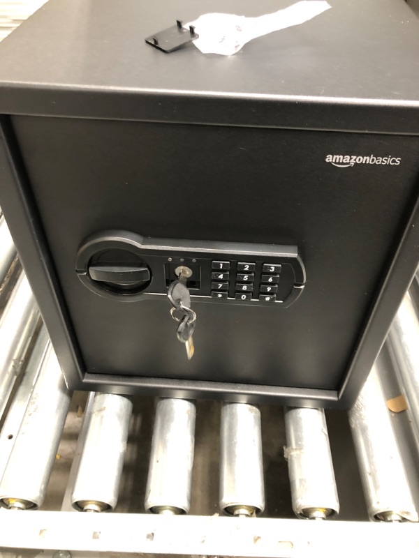 Photo 1 of Amazon Basics Steel Home Security Safe with Programmable Keypad - Valuables - 1.2 Cubic Feet, 13 x 13 x 14.2 Inches, Black & 8-Sheet Capacity, Cross-Cut Paper and Credit Card Shredder, 4.1 Gallon