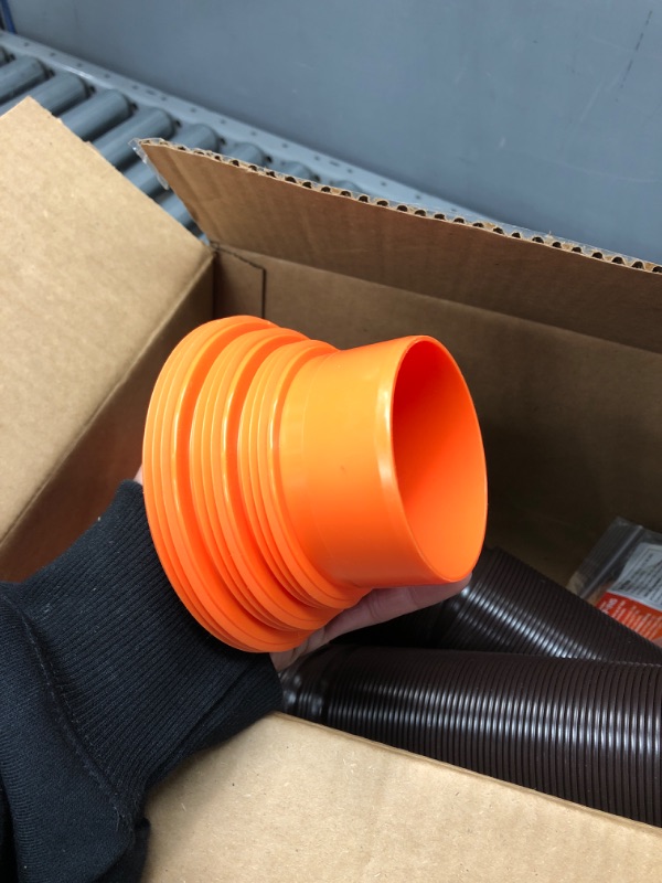 Photo 5 of Camco 20' (39742) RhinoFLEX 20-Foot RV Sewer Hose Kit, Swivel Transparent Elbow with 4-in-1 Dump Station Fitting-Storage Caps Included , Black , Brown 20ft Sewer Hose Kit Frustration-Free Packaging